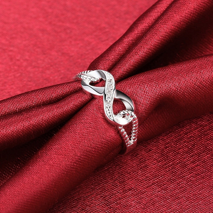 Simulated CZ Diamond Infinity Ring in 18K White Gold Image 4