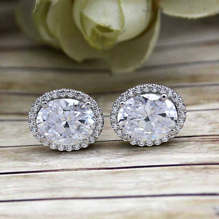 Oval Cut Halo Stud Earrings Made With Crystals From Swarovski Image 2