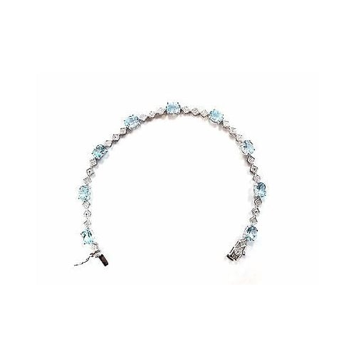 9 CARAT OVAL BLUE TOPAZ AND DIAMOND BRACELET IN RHODIUM PLATED BRASS Image 3