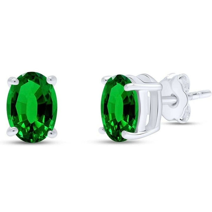 14k White Gold Over Silver 5x7 Oval Cut Created Emerald Oval Diamond Stud Earrings Image 1