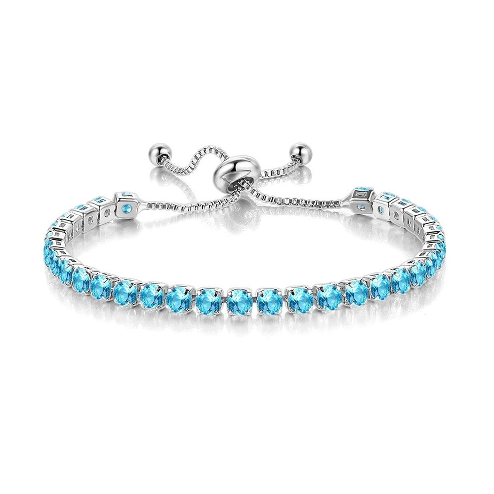 Paris Jewelry 10k White Gold Plated 6 Ct Round Created Aquamarine Sapphire CZ Tennis Bracelet for Adult Female by PJ Image 1