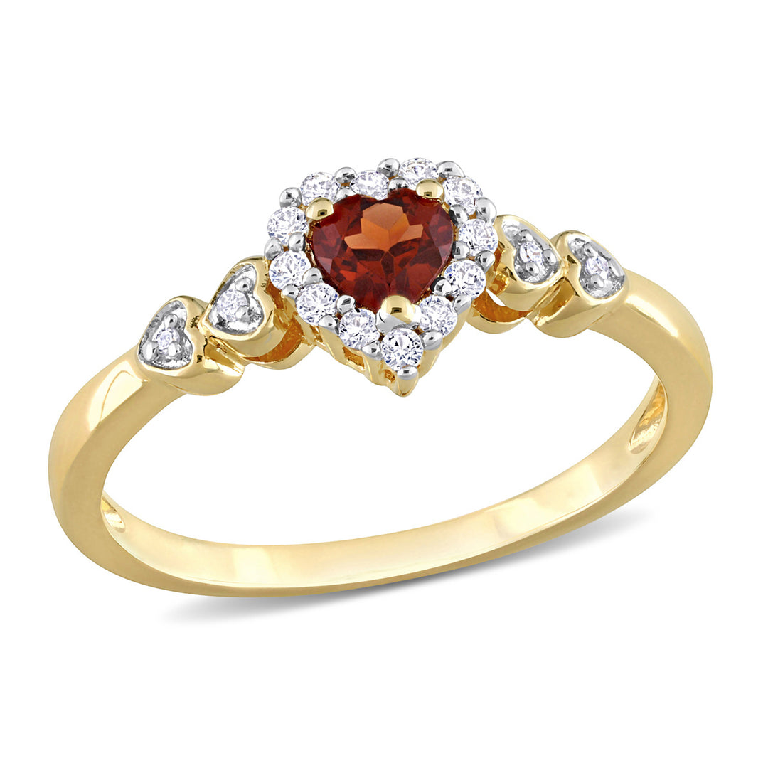 1/4 Carat (ctw) Garnet Heart Ring in Yellow Plated Silver with Lab Created White Sapphires Image 1