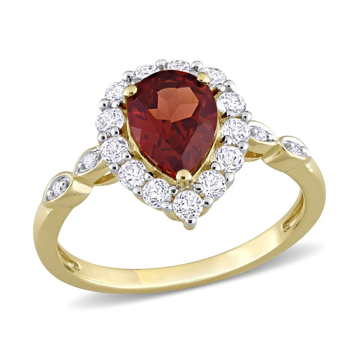 1.30 Carat (ctw) Pear Garnet Halo Ring in 10K Yellow Gold with White Topaz Image 1