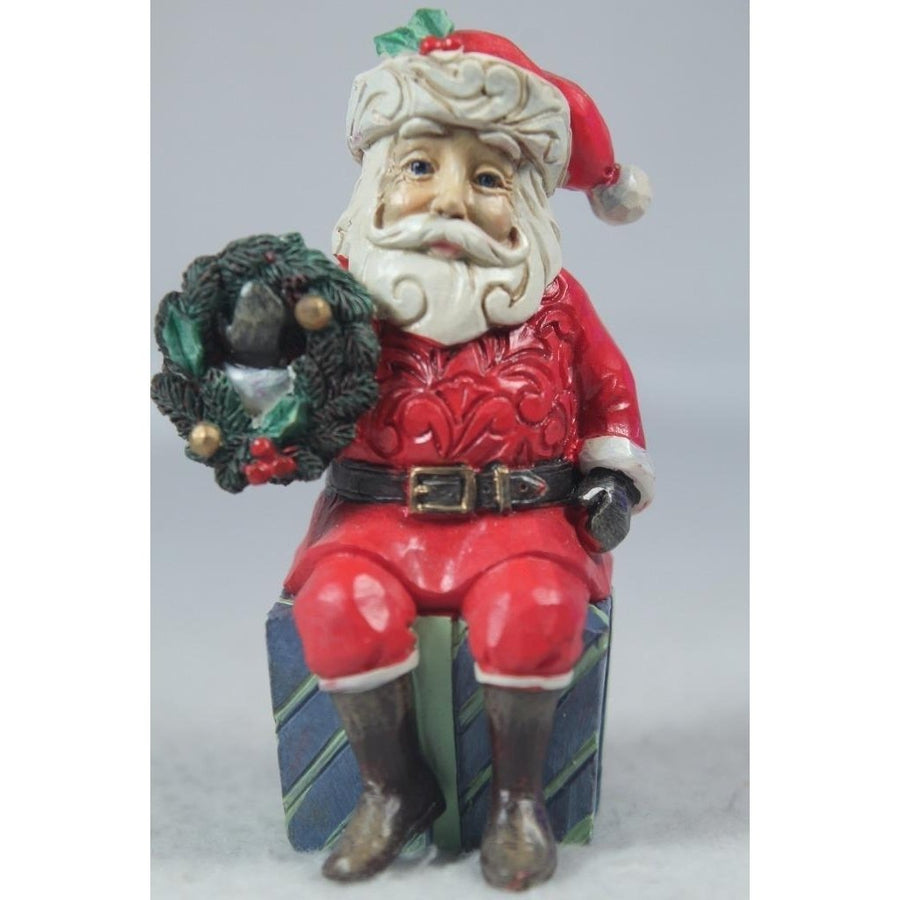 Jim Shore Santa Sitting On Gifts 2022 Mini 6011487 In Box Image 1