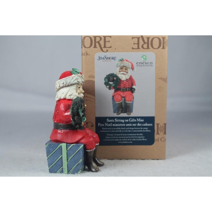 Jim Shore Santa Sitting On Gifts 2022 Mini 6011487 In Box Image 3